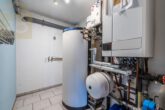 Heizungsraum - Zweifamilienhaus mit Schwimmbad, 3 Garagen und großem Grundstück – ideal für Pferdeliebhaber!