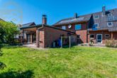 Garten - Zweifamilienhaus mit Schwimmbad, 3 Garagen und großem Grundstück – ideal für Pferdeliebhaber!