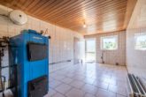 Heizungsraum/Waschküche - Zweifamilienhaus mit Schwimmbad, 3 Garagen und großem Grundstück – ideal für Pferdeliebhaber!