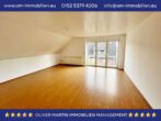 Wohnzimmer WE2 - Renditepaket in Weyhausen: 3 Wohneinheiten vollvermietet! Mein Haus = Mein Makler!
