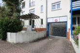 Tiefgarageneinfahrt - Gepflegte Erdgeschosswohnung mit Gartenanteil und Tiefgaragenstellplatz! Meine Wohnung=Mein Partner!