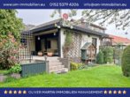 Hausansicht - Unterkellerter Bungalow mit großem Grundstück und Doppelcarport in Parsau! Mein Haus = Mein Makler!