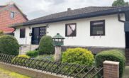 Hausansicht - Unterkellerter Bungalow mit großem Grundstück und Doppelcarport in Parsau! Mein Haus = Mein Makler!