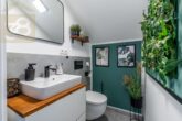 Gäste-WC - Hochmoderne 3-Zimmer-Neubauwohnung mit Sonnenterrasse Meine Immobilie = Mein Makler!