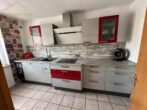 Küche - Familienfreundliches Reihenmittelhaus in ruhiger Lage – mit Carport