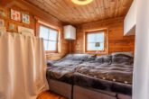 Schlafzimmer - Blockbohlenhaus im Bungalow-Stil in Tülau! Mein Haus = Mein Partner!