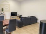 Wohnzimmer - Neuwertige 2-Zimmer Doppelhaushälfte mit großer Terrasse & Kaminofen! Meine Immobilie – mein Partner