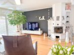 Wohnzimmer - Charmante Doppelhaushälfte mit Kamin, Terrasse und Garten in Vorsfelde!