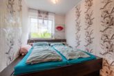 Schlafzimmer (1) - 4-Zimmer-Wohnung mit neuwertiger Küche, Garage & Balkon in Wolfsburg! Meine Wohnung = Mein Partner!