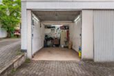 Garage (2) - 4-Zimmer-Wohnung mit neuwertiger Küche, Garage & Balkon in Wolfsburg! Meine Wohnung = Mein Partner!