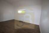 Schlafzimmer Wohnung 1 EG - Modernes Mehrfamilienhaus mit drei Wohneinheiten und Baugrundstück! Mein Haus = Mein Makler!