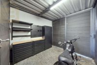 Werkstattbereich angrenzend an Carport