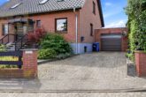 Hofeinfahrt - Gepflegtes Einfamilienhaus mit großem Garten, Terrasse und Tandemgarage!Meine Immobilie=Mein Partner