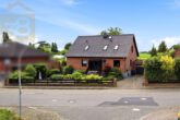 Hausansicht - Gepflegtes Einfamilienhaus mit großem Garten, Terrasse und Tandemgarage!Meine Immobilie=Mein Partner