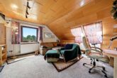 Wohnzimmer DG - Gepflegtes Einfamilienhaus mit großem Garten, Terrasse und Tandemgarage!Meine Immobilie=Mein Partner