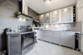 Küche - Gepflegtes Einfamilienhaus mit großem Garten, Terrasse und Tandemgarage!Meine Immobilie=Mein Partner