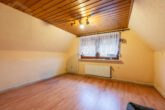 Zimmer (oben) - Gepflegtes Einfamilienhaus mit Garage & Garten in Woltwiesche! Meine Immobilie=Mein Makler!
