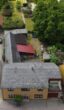Luftbild - Einfamilienhaus mit alter Stallung und großem Grundstück!