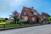 Hausansicht - Einfamilienhaus mit traumhaften Garten und zwei Garagen in Didderse! Meine Immobilie = Mein Partner!