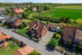 Hausansicht - Einfamilienhaus mit traumhaften Garten und zwei Garagen in Didderse! Meine Immobilie = Mein Partner!