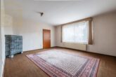 Wohnzimmer EG - Einfamilienhaus mit Einliegeroption und großem Potenzial im historischen Ortskern von Hehlingen