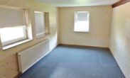 Schlafzimmer - 14 vermietete Wohneinheiten bei Bad Helmstedt als Kapitalanlage! Mein Haus = Mein Makler!