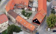 Luftbild - 14 vermietete Wohneinheiten bei Bad Helmstedt als Kapitalanlage! Mein Haus = Mein Makler!