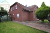 Hausansicht vom eigenen Garten - Moderne 3-Zimmerwohnung in Brechtorf – Meine Wohnung = Mein Makler!